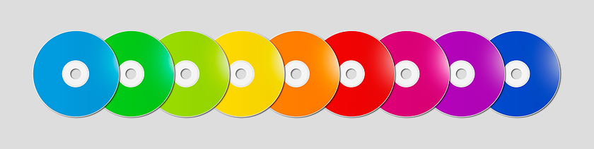 Image showing Colorful rainbow CD - DVD range on grey background banner