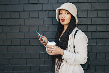 Image showing Outdoor, portrait and coffee with smartphone, woman or connection with sms on wall background. Person, email or girl with cellphone, mobile user or urban town with digital app, tea or search internet