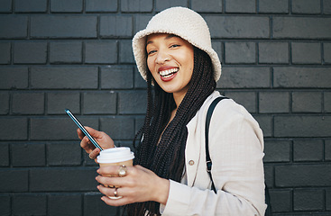 Image showing Portrait of happy woman with phone, brick wall and urban fashion, social media chat and internet meme. Streetwear, gen z girl or online influencer with smartphone, smile and communication with coffee
