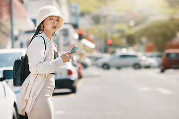 Image showing Street, and woman waiting for taxi with phone and wall thinking about commute in city. Road, urban and female person with mobile in New York with travel, journey and holiday adventure on solo trip