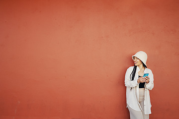 Image showing Mockup, smile and woman with phone in city for travel, freedom or location guide on orange background. Smartphone, app and lady fashion influencer outdoor on social media, blog or podcast content