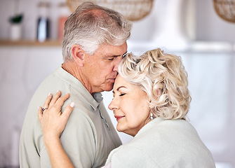 Image showing Hug, support and forehead kiss by senior couple with love, security and comfort in their home. Romance, retirement and elderly man embrace old woman with soulmate, connection and intimacy in a house