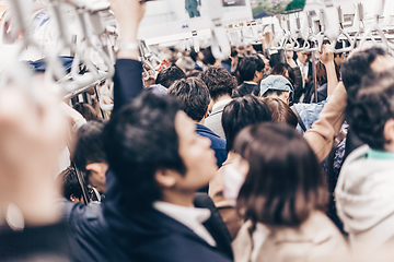 Image showing Passengers traveling by Tokyo metro.