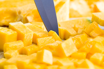 Image showing sliced and diced orange pumpkin