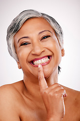 Image showing Makeup, studio portrait and mature happy woman with anti aging routine, skincare shine or facial detox results. Collagen, wellness and face of aesthetic model with skin foundation on white background