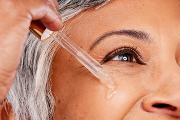 Image showing Beauty face, mature woman or serum skincare hydration, anti aging collagen or studio essential oil. Retinol dropper, closeup skin texture or eye of model with facial cosmetic care on white background