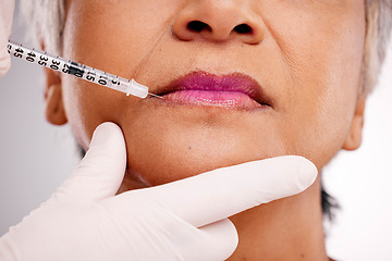 Image showing Mouth needle, plastic surgery hands and woman with closeup surgeon augmentation, lip filler or silicone treatment. Studio spa clinic, collagen injection and client transformation on white background