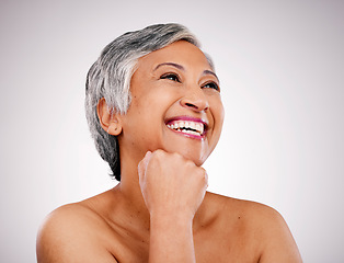 Image showing Mature woman, thinking and skincare in studio for aesthetic wellness, cosmetics or healthy facial collagen on white background. Face of happy model, natural beauty and shine with ideas of dermatology