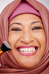 Image showing Makeup brush, smile and portrait of muslim woman in studio for cosmetic, natural and face routine. Happy, self care and mature islamic female model with cosmetology tool for facial glamour treatment.