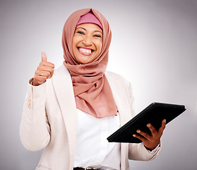 Image showing Muslim woman, thumbs up and tablet for success, like and subscribe to human resources website in studio. Portrait of business person in dubai, digital results or HR job support on a white background