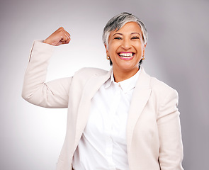Image showing Arm flex, business and woman with portrait, strong and winning on a white studio background. Happy ceo, mature person and accountant with strength, empowerment and career with freedom and employee