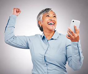 Image showing Business woman, wow and phone celebration for success, power and yes with news, bonus or winning in studio. Happy manager or excited winner on mobile for achievement or job goals on white background