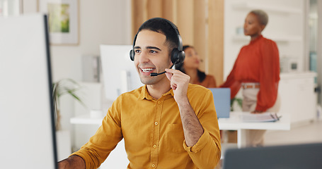 Image showing Call center, man and communication at computer in office for CRM questions, FAQ contact and IT support. Happy telemarketing agent at desktop for sales advisory, telecom solution and consulting client