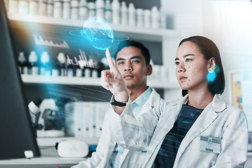Image showing Medical, research and man with woman, hologram and futuristic with chemistry, global and cure development. Holographic, staff or coworkers with cooperation, teamwork or data analytics in a laboratory