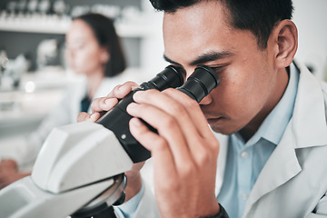 Image showing Microscope, face of man and laboratory for science research, dna analysis or studying chemical development. Scientist, biotechnology and check lens to review investigation, test or medical assessment