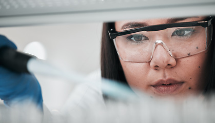 Image showing Test tubes, scientist analysis and woman with investigation and science research of an Asian person. Laboratory, professional and healthcare worker with medicine and liquid check for hospital test