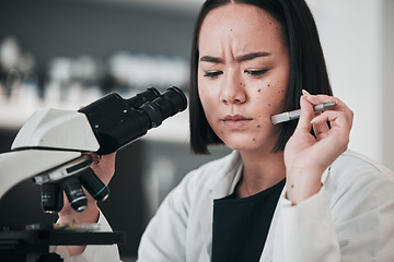 Image showing Microscope, scientist and stress of woman in laboratory, research challenge or angry. Science, medical professional and frustrated Asian person fail in experiment test, tired or mistake in healthcare