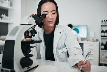 Image showing Microscope, woman and writing in laboratory for science research, dna analysis and notes. Asian scientist, biotechnology and review investigation, test report and check lens for assessment results