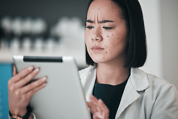 Image showing Tablet, pharmacy and confused Asian woman in laboratory for website, wellness app and telehealth. Healthcare, pharmaceutical and worker on digital tech for medical service, medicine and research