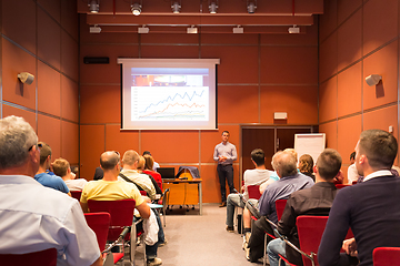 Image showing Business speaker giving talk at business conference event.