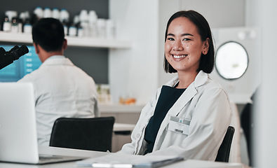 Image showing Scientist, woman and portrait at laptop in laboratory for innovation, research and biotechnology software. Happy asian science technician working online to review data, investigation and development