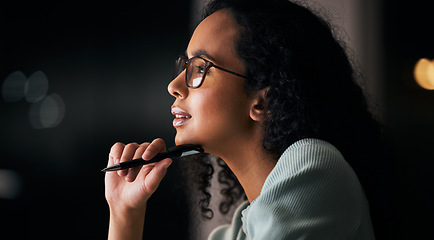 Image showing Business, night and thinking with woman, solution and deadline with planning, project and ideas. Dark, person or entrepreneur with problem solving, decision or choice with creativity or brainstorming