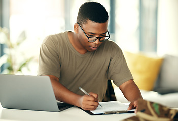 Image showing Budget, planning and black man with remote work with paperwork for accounting, finance or strategy. Entrepreneurship, house and African entrepreneur or freelance worker with a document for investment