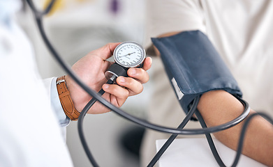 Image showing Hands, blood pressure and doctor with patient in consultation at hospital in clinic test. Hypertension, exam and arm of person with medical professional for check up for heart health, advice and care
