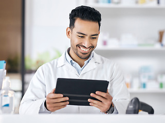 Image showing Man in pharmacy with tablet, checklist and medicine on website with online info. Pharmacist, digital app and inventory stock research with check for pharmaceutical drugs, telehealth or healthcare.