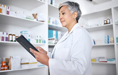 Image showing Tablet, medicine pharmacist and woman research, search or reading online product description, drugs or medical stock. Clinic, mature pharmacy worker or check supplement, healthcare data or pills info