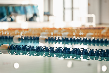 Image showing Swimming pool, lines in water for competition or race lane for fitness or underwater sports with empty reflection. Exercise, workout and fresh, swim training arena for professional indoor challenge.