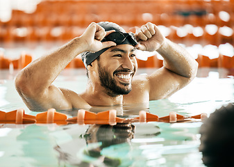 Image showing Smile, sports and fitness with man in swimming pool for competition, workout and health. Wellness, happy and exercise with person training in race for performance, contest and speed challenge