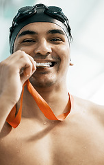 Image showing Sports winner, swimming medal and man portrait with competition success, fitness achievement and winning race. Motivation, athlete and swimmer performance prize, pride and champion bite gold award