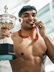 Image showing Sports winner, swimming trophy and man portrait with competition success, achievement goal and winning race. Medal, athlete and swimmer with prize, pride and champion bite award at challenge event