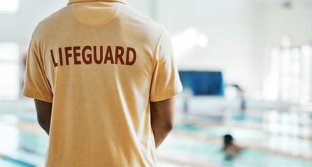 Image showing Lifeguard safety, swimming pool and back of person ready for job, rescue support or helping with danger, security or life saving. Mockup space, public worker and first aid expert for protection care