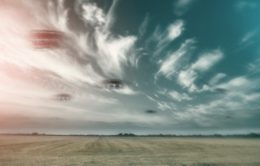 Image showing UFO, spaceship and nature with alien in sky with fantasy or science fiction event in countryside, field or landscape with clouds. Earth, aliens and extraterrestrial drone in environment with blur