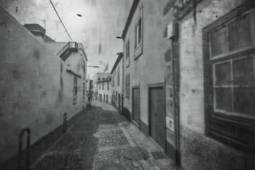 Image showing City home, black and white street and travel on alley and retro buildings or architecture. Urban town, destination or historic house and monochrome tourist art photography on road in Netherlands