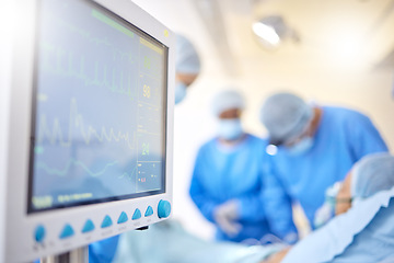 Image showing Heart monitor, hospital team and surgery of patient for emergency, healthcare or urgency. Doctors or surgeon group for medical operation, teamwork and electrocardiogram technology in theatre