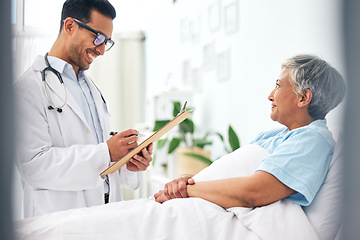 Image showing Happy woman in bed, doctor with medical chart and checklist for health insurance, consultation and advice. Smile in hospital, healthcare professional with patient information, results and talking.