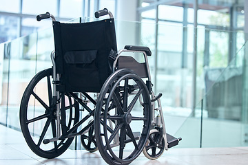 Image showing Healthcare, rehabilitation and a wheelchair at a hospital for support, physiotherapy or disability help. Nursing, medical and equipment or a chair for clinic transportation, recovery or inclusion