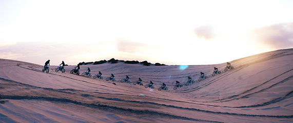 Image showing Banner, sunset and bikers in nature for travel, group exercise and fitness. Team, sports and people, racer or friends with motorbike, cycling and adventure on a holiday for training in the desert