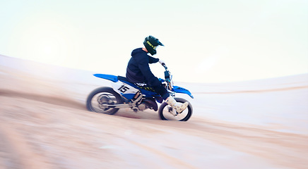 Image showing Sports, desert and athlete on motorbike for action, adrenaline and skill training for challenge, Fitness, sand dunes and man biker practicing for race, competition or performance adventure at a rally