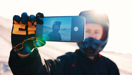 Image showing Phone selfie, biker and man in desert adventure, nature or sport outdoor. Rider, helmet and person take picture on smartphone to travel on social media, transportation and off road journey in Namibia