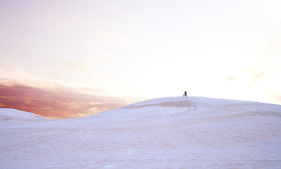 Image showing Sand, success or athlete driving motorcycle for goal, adventure or fitness with a winning performance. Winner, sports or champion on motorbike on dunes hill for achievement, target or race challenge