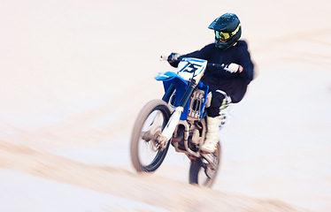 Image showing Sand, hill or athlete with motorbike for action, adventure or fitness with performance for adrenaline. Fast, speed or sports person on motorcycle on dunes for training, exercise or race or challenge