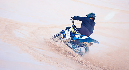 Image showing Sports, sand dunes and athlete on motorbike for action, adrenaline and skill training for challenge, Fitness, desert and man biker practicing for race, competition or performance adventure at a rally