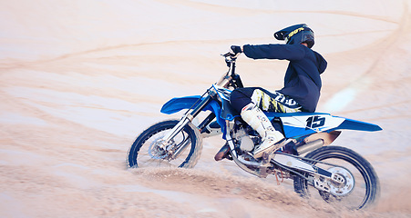Image showing Sports, desert and athlete on bike for fitness, adrenaline and skill training for challenge. Action, dunes and man biker practicing for race, competition or performance adventure at off road rally.