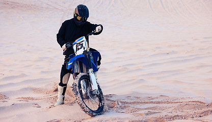 Image showing Sand, rally or athlete driving motorcycle for action, adventure or fitness with performance or adrenaline. Desert, sports or person on motorbike on dunes for training, exercise or race or challenge