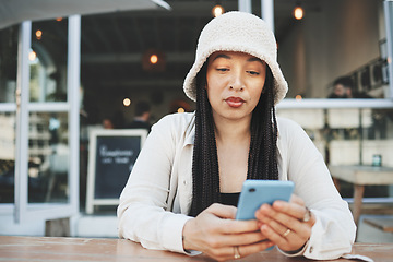 Image showing Phone, woman and reading internet chat with technology and connection at outdoor coffee shop. Smartphone, person and networking or online scroll for information, conversation and texting with network
