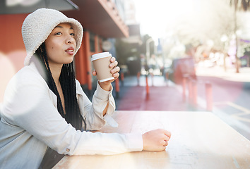 Image showing Outdoor, coffee shop and woman relax with drink at cafe, restaurant or table at bistro with gen z in streetwear or urban fashion. City, style and girl in town drinking cappuccino in cup with bokeh